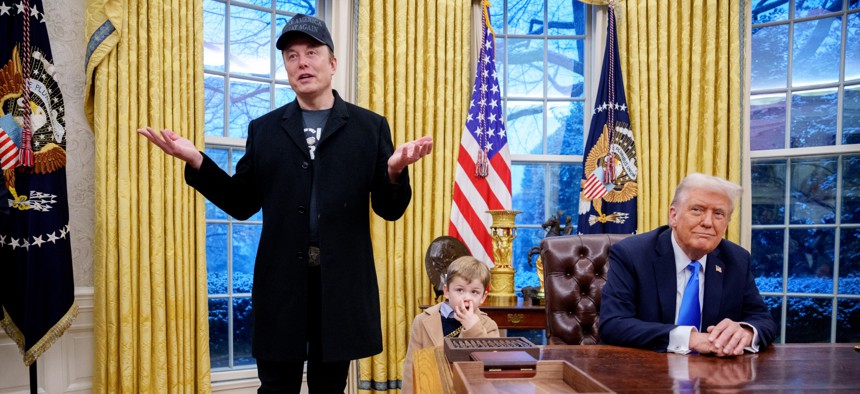 Tesla and SpaceX CEO Elon Musk, accompanied by President Donald Trump and his son X Musk, speaks during an executive order signing in the Oval Office at the White House on Feb. 11, 2025.